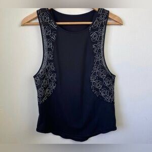 Lululemon Athletica Black Tank Top with Floral Design size 8?